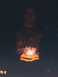 Close-up of illuminated fire at night