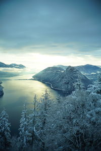 Scenic view of mountains against sky during winter