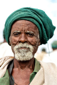 Portrait of man wearing hat outdoors