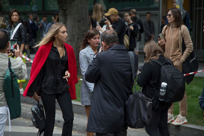 Group of people walking in city