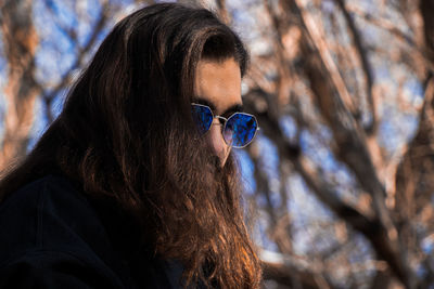 Side view of young man looking away