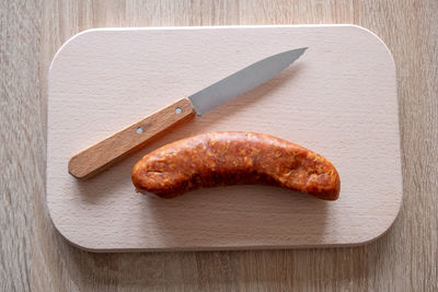 High angle view of bread on cutting board