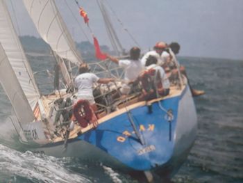 Group of people on sailboat at beach