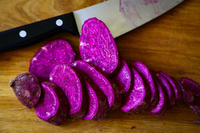 Close-up of chopped sweet potato on cutting board 