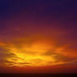 Scenic view of dramatic sky during sunset