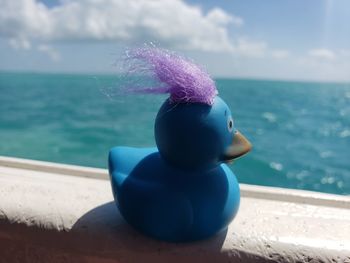 Close-up of blue sea against sky