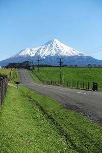 Scenic view of snowcapped mountains against clear sky