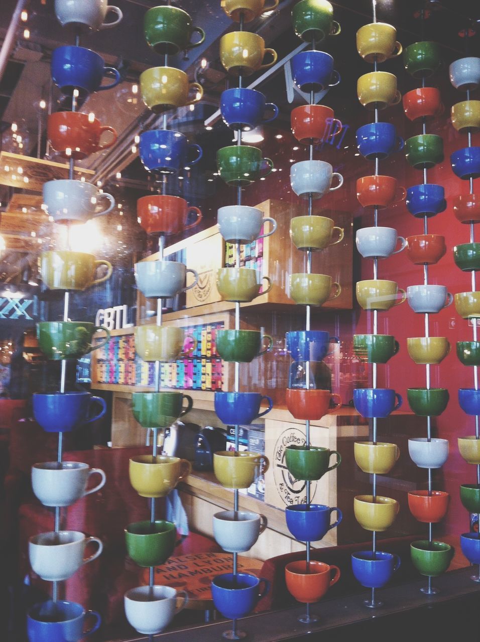 indoors, large group of objects, multi colored, abundance, variation, still life, arrangement, illuminated, in a row, choice, lighting equipment, decoration, order, table, food and drink, close-up, colorful, no people, repetition, collection