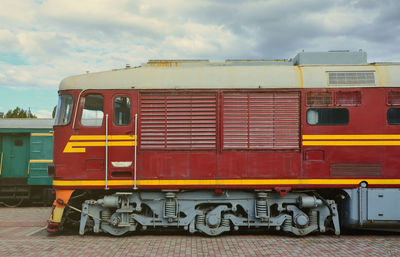 Train on railroad track against sky