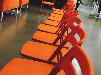 High angle view of man sitting on chair