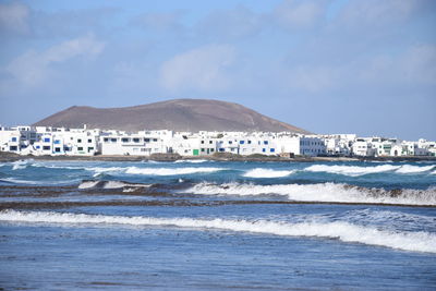 Scenic view of beach against sky