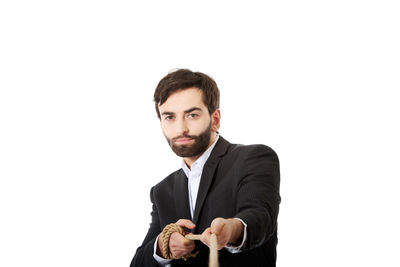 Portrait of young man against white background