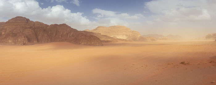 Scenic view of desert against sky