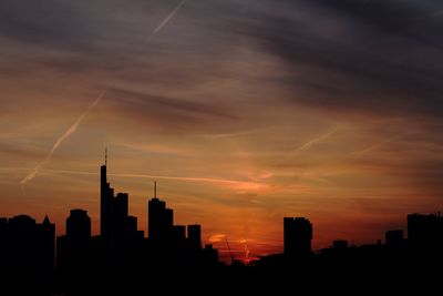 Silhouette of building at sunset