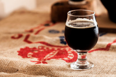 Close-up of beer in glass on table