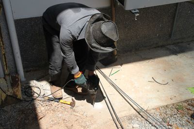 High angle view of man working at construction industry