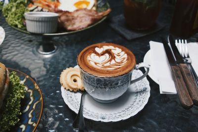 High angle view of coffee cup on table