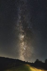 Scenic view of star field against sky at night