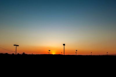 Silhouette of built structure against clear sky