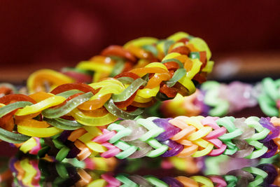 Close-up of colorful bracelets at market for sale