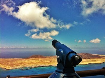 Scenic view of landscape against cloudy sky