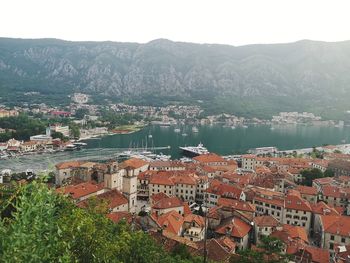 High angle view of townscape by river