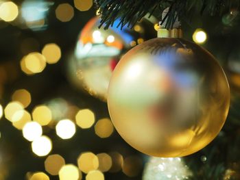 Close-up of illuminated christmas tree