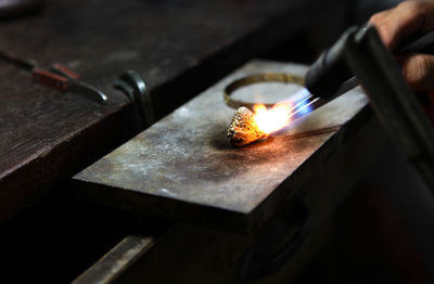 Man working on metal