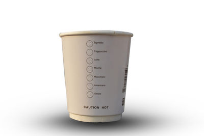 Close-up of coffee cup against white background