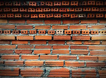 Full frame shot of red brick wall