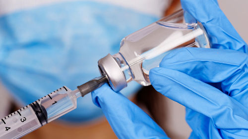 Close-up of hand holding eyeglasses