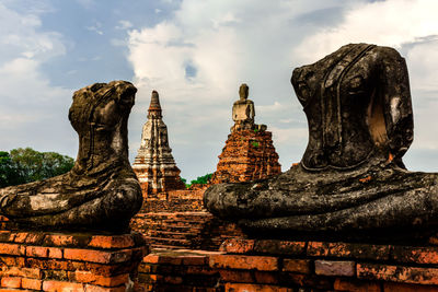 Low angle view of old building in ayutthaya province under the blue sky