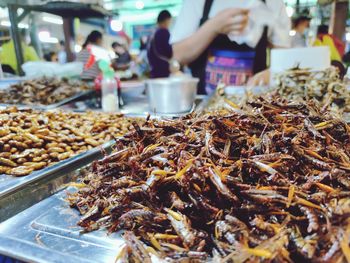 People at market stall