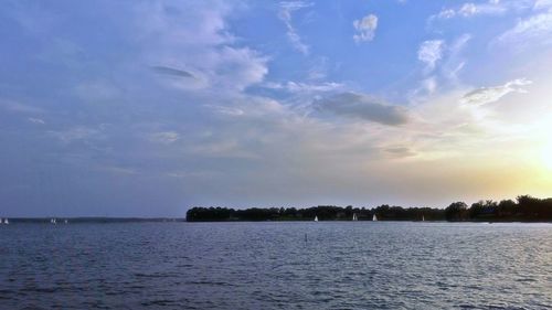 Scenic view of sea at sunset