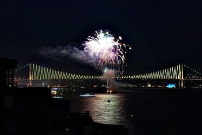 Firework display at night