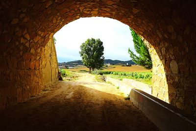 Narrow tunnel leading to tunnel