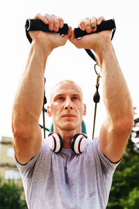 Mid adult man exercising outdoors