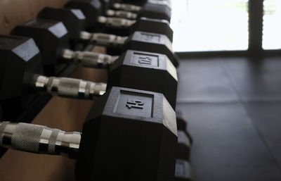 Close-up of dumbbells on table