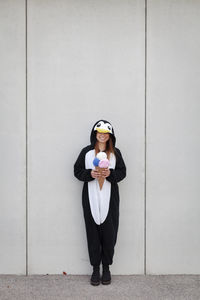 Woman in costume standing outdoors