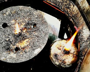 Close-up of burning candles