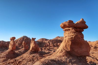 Landscape of strange small vertical rock formations in goblin valley state park in utah