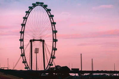 Singapore flyer at sunset