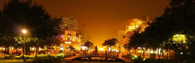 Illuminated street light at night