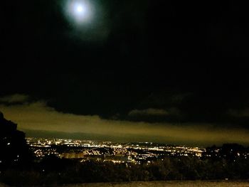 Illuminated cityscape at night