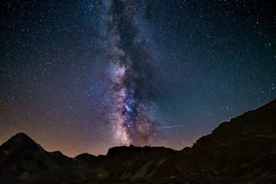 Low angle view of stars in sky at night