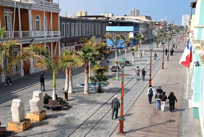 People walking on street in city