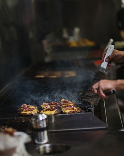 Person preparing food in kitchen