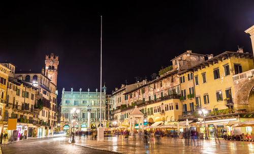 Buildings in city at night