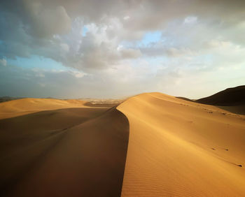 Scenic view of desert against sky