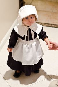 High angle portrait of cute girl wearing nun costume during halloween